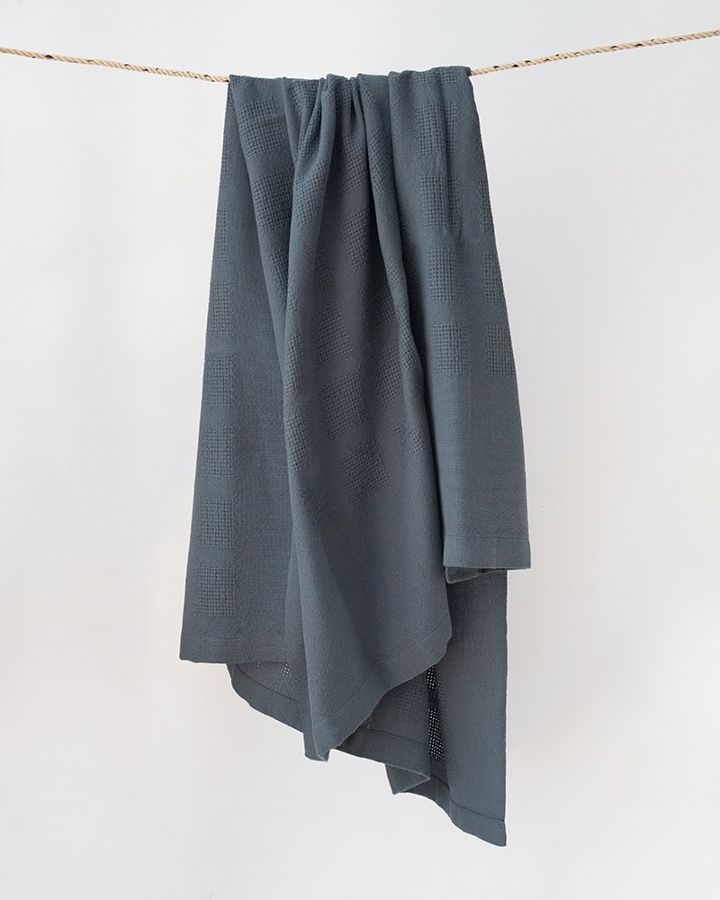 Draped Mungo Cot Baby Blanket woven from 100% Organic Cotton in Spruce.