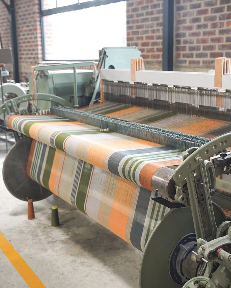 The Stria Tablecloth on the Saurer loom woven in the Mungo Mill.