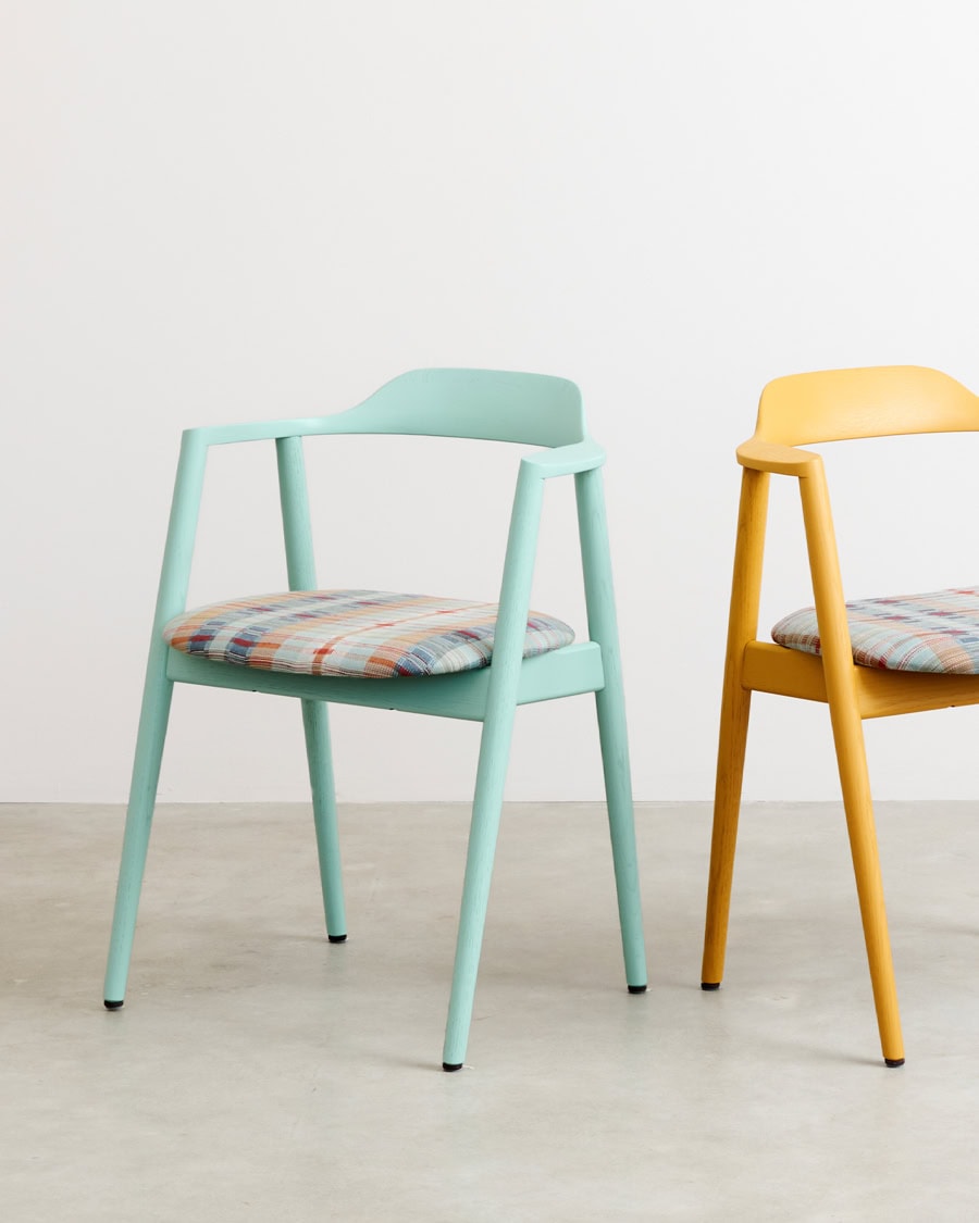 Collaboration with James Mudge Harrington chairs with Mungo Miro cloth.