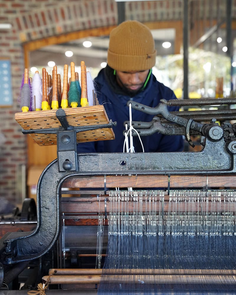 Weaving the Mos Wrap on the loom in the Mungo Mill.