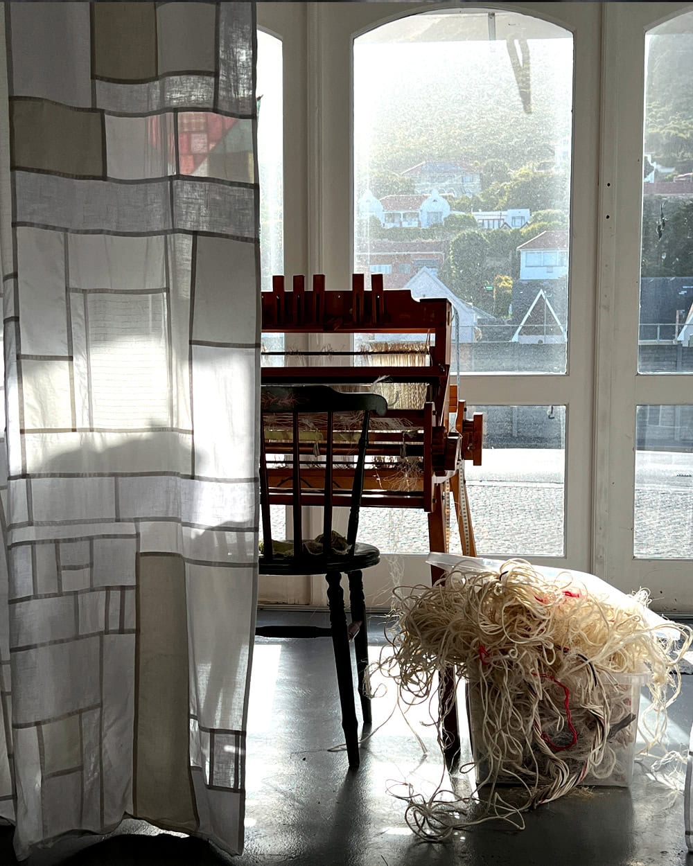 Lucie's studio with fishing rope weaving.