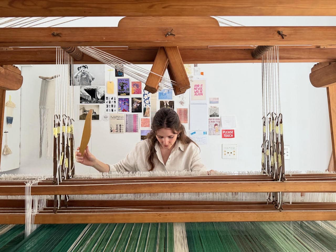 Lucie Panis Jones at her loom in her studio.