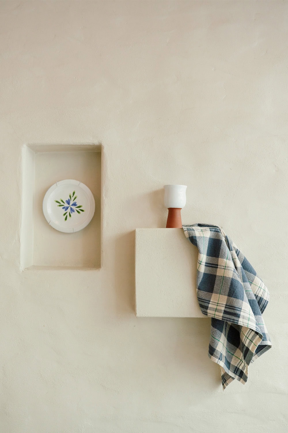 Ouzeri restaurant with the Mungo Vadoek Tea Towel on a shelf.