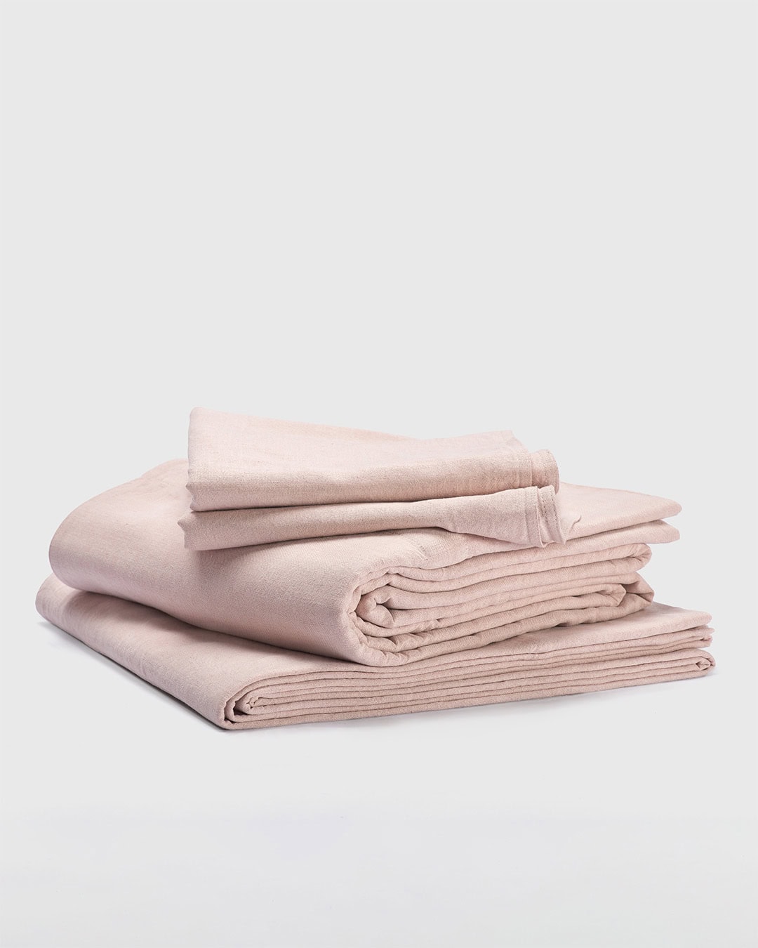 Mungo Union Cloth bedding in the Blush colourway.